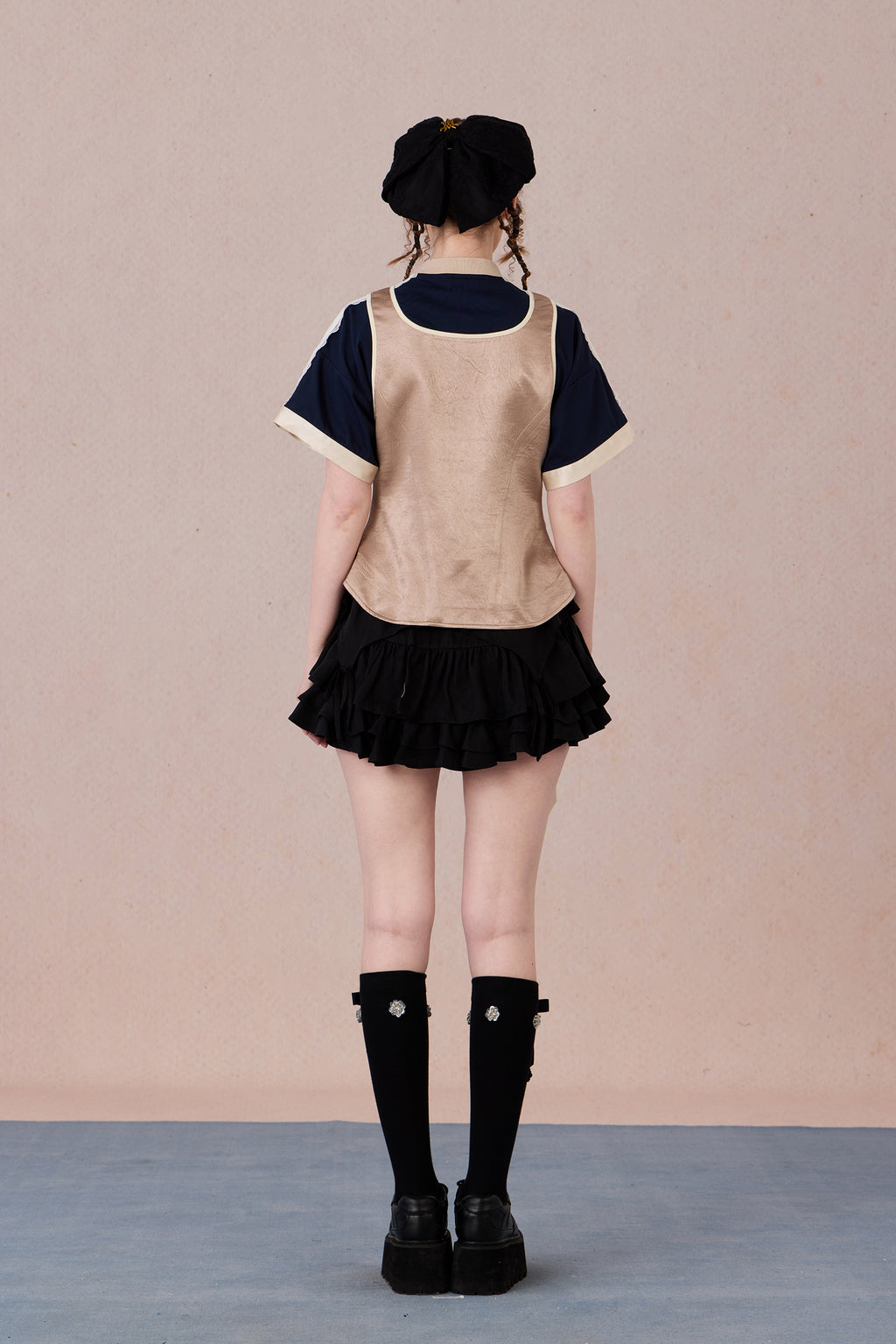  Feminine cotton blend top with handcrafted bead detail