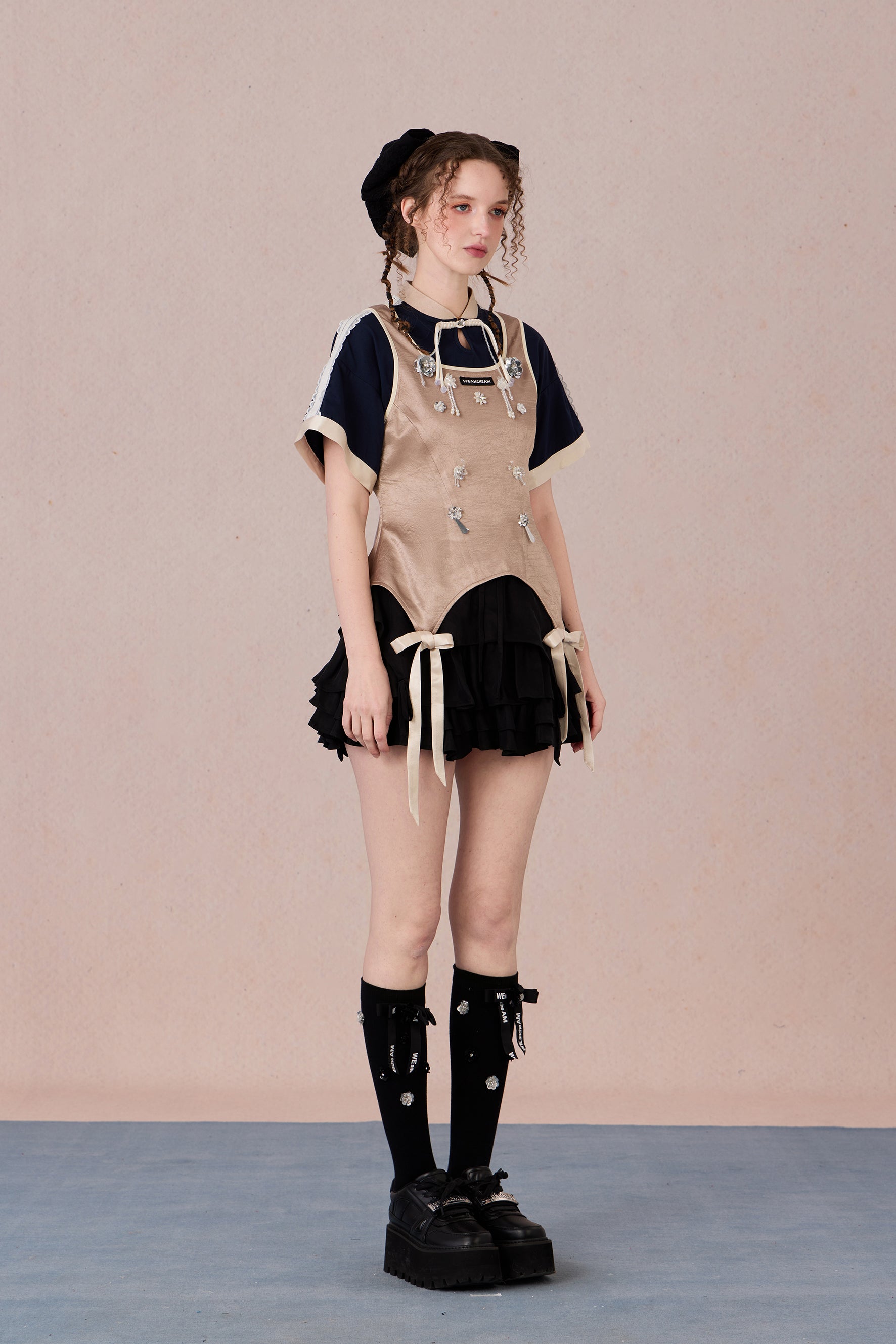 Feminine cotton blend top with handcrafted bead detail