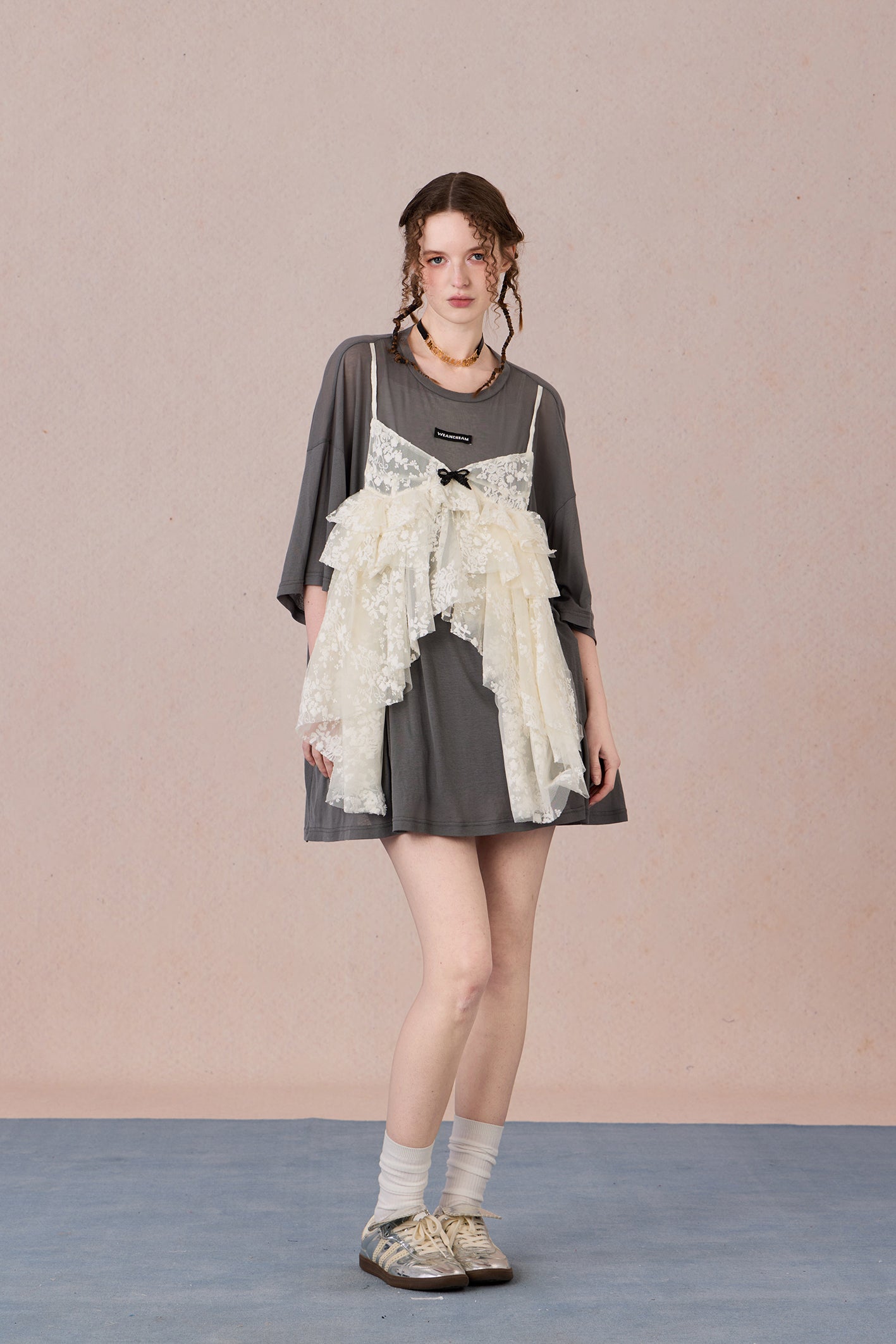  Layered cotton blend top with sheer base and romantic lace