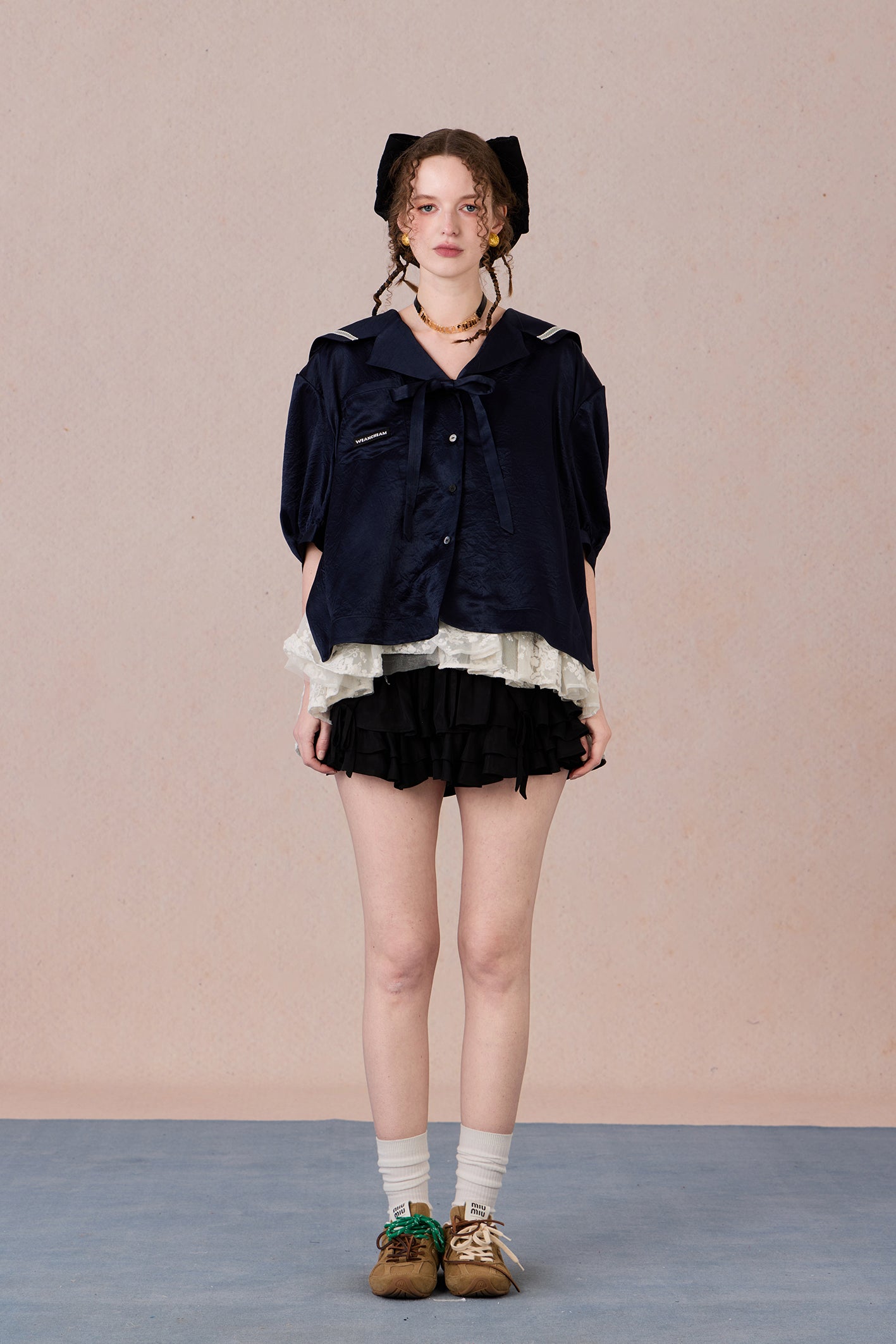 V-neck shirt with tie detail and soft floral print