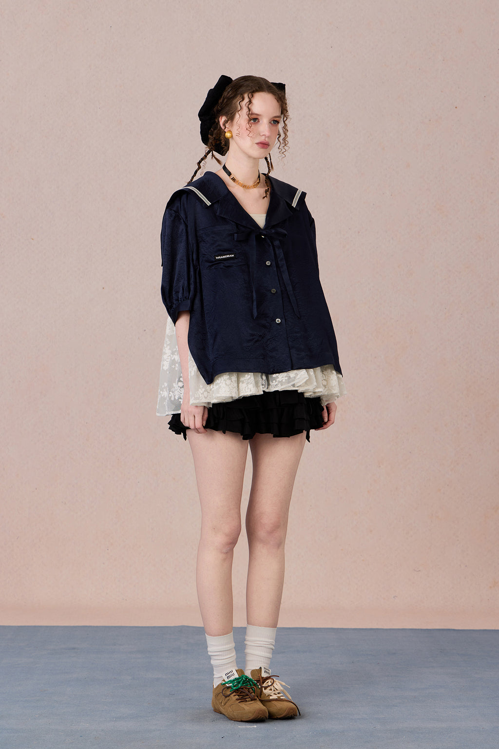 V-neck shirt with tie detail and soft floral print