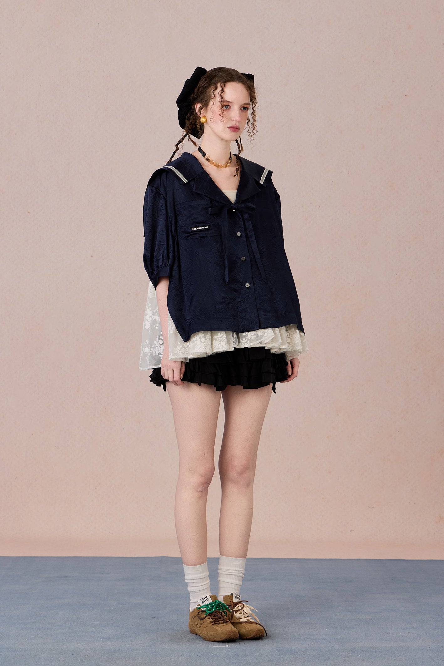 V-neck shirt with tie detail and soft floral print