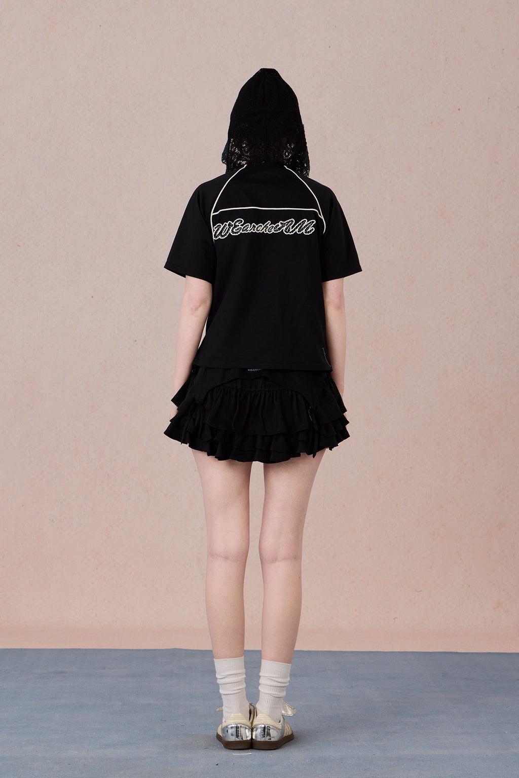 Brand logo detail and lace sleeve polo T-shirt back view