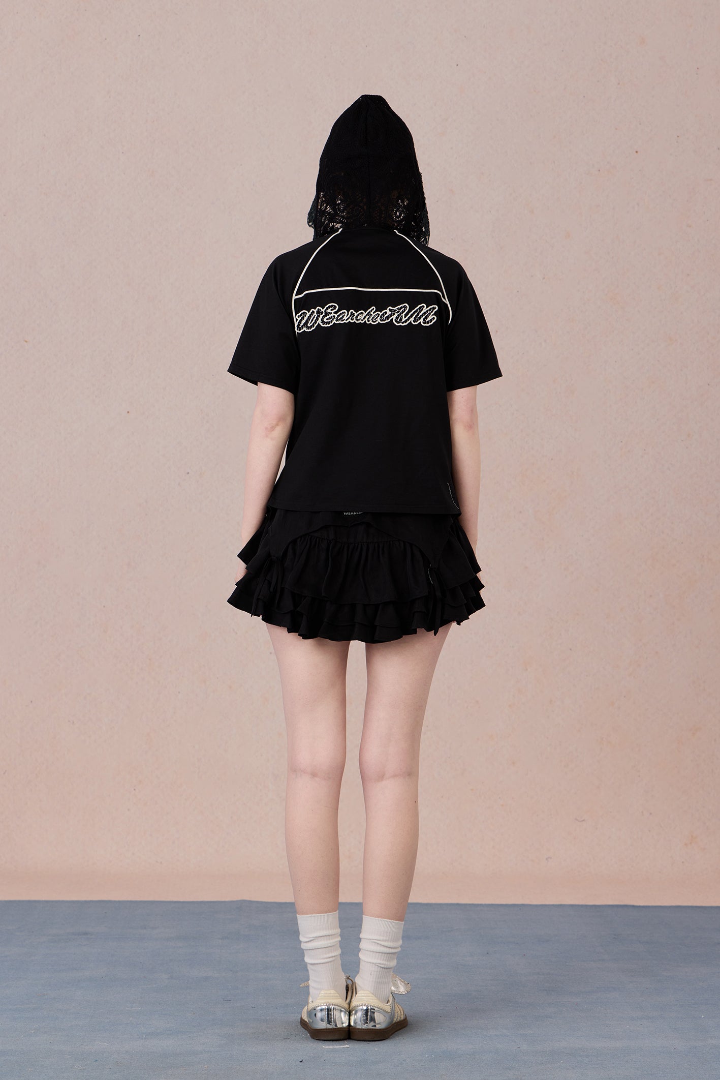 Brand logo detail and lace sleeve polo T-shirt back view