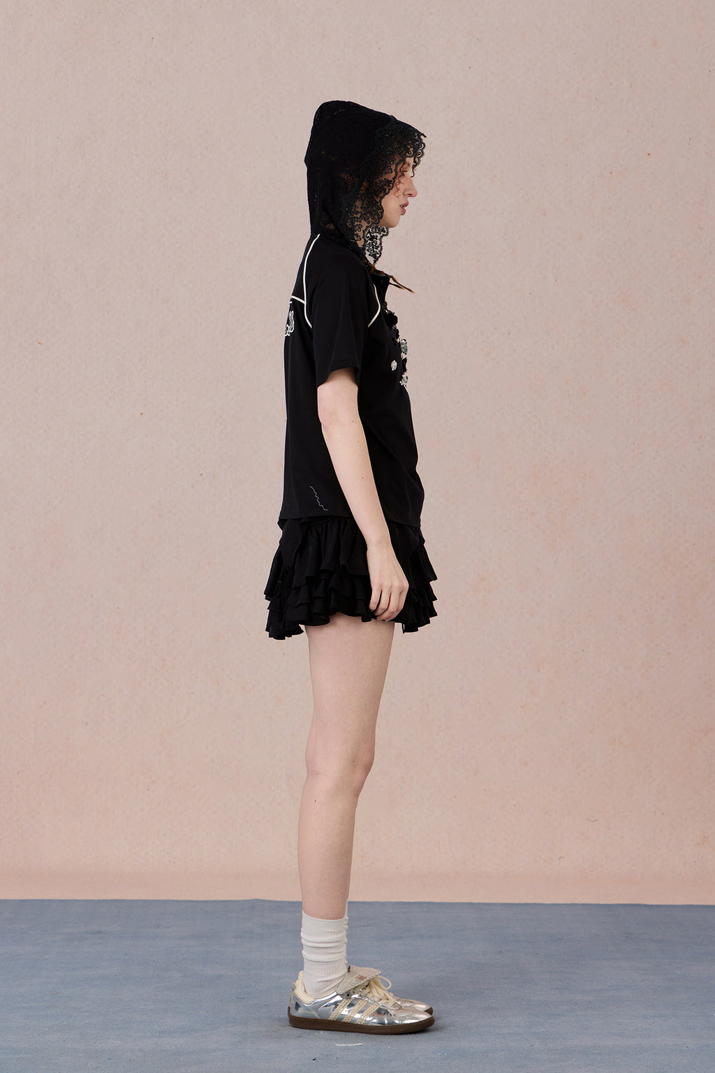 Feminine short sleeve embellished tee with soft drape and casual elegance
