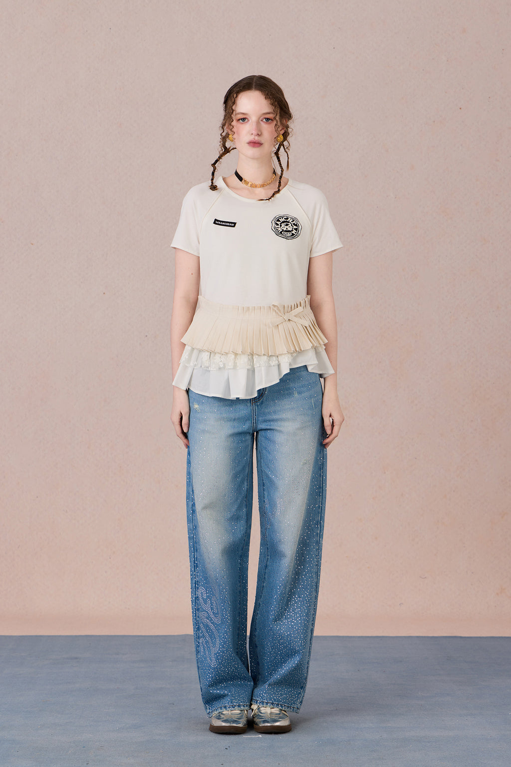 Asymmetrical cotton top with lace trim and layered textures