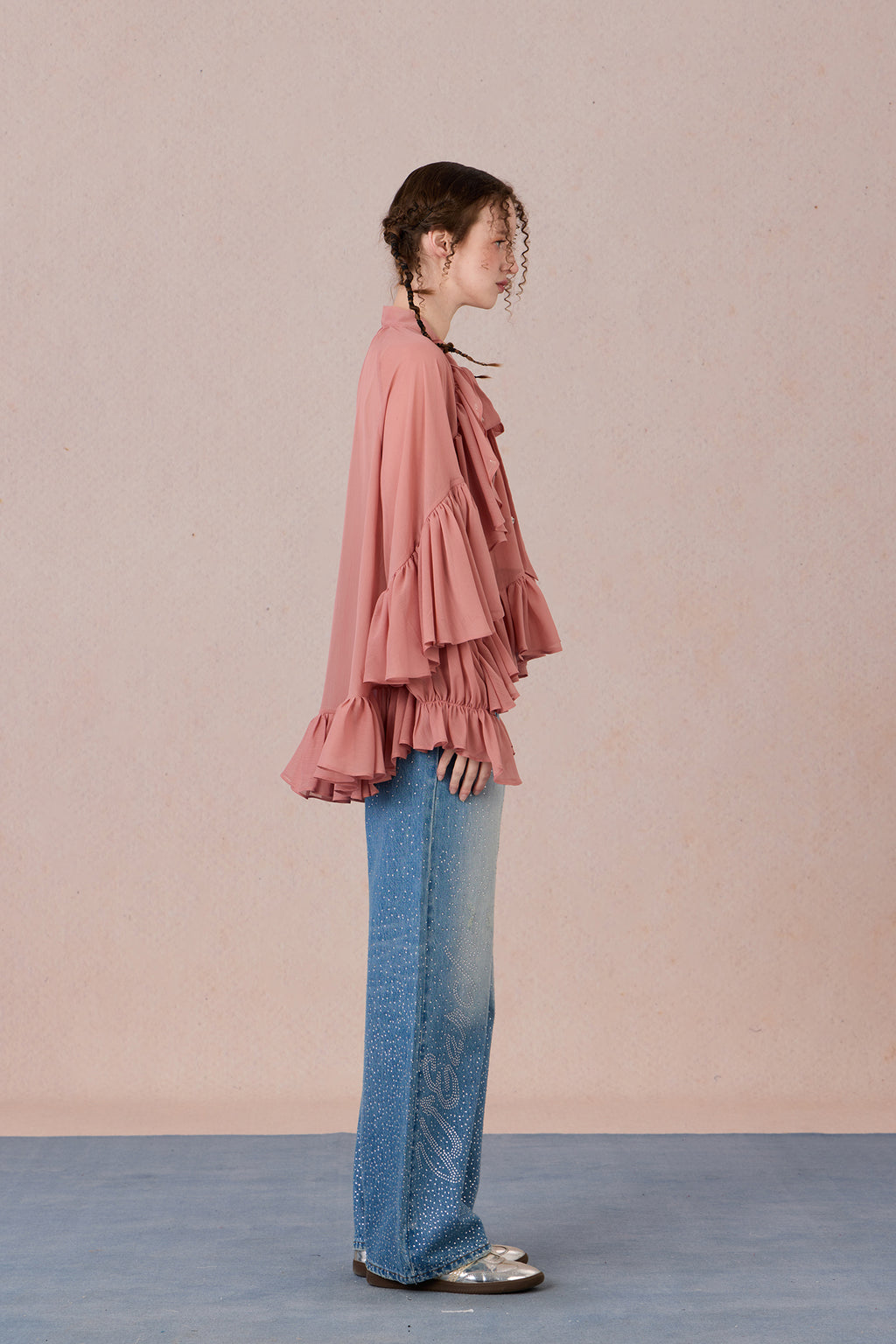 Sheer romantic blouse with flowing silhouette and tulle texture