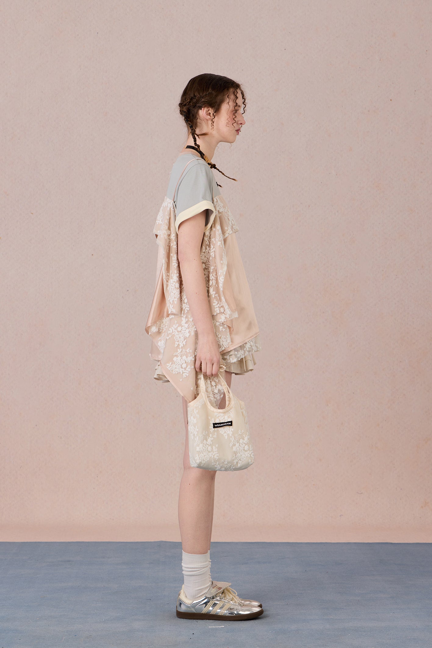 Romantic two-piece look blouse paired with trousers