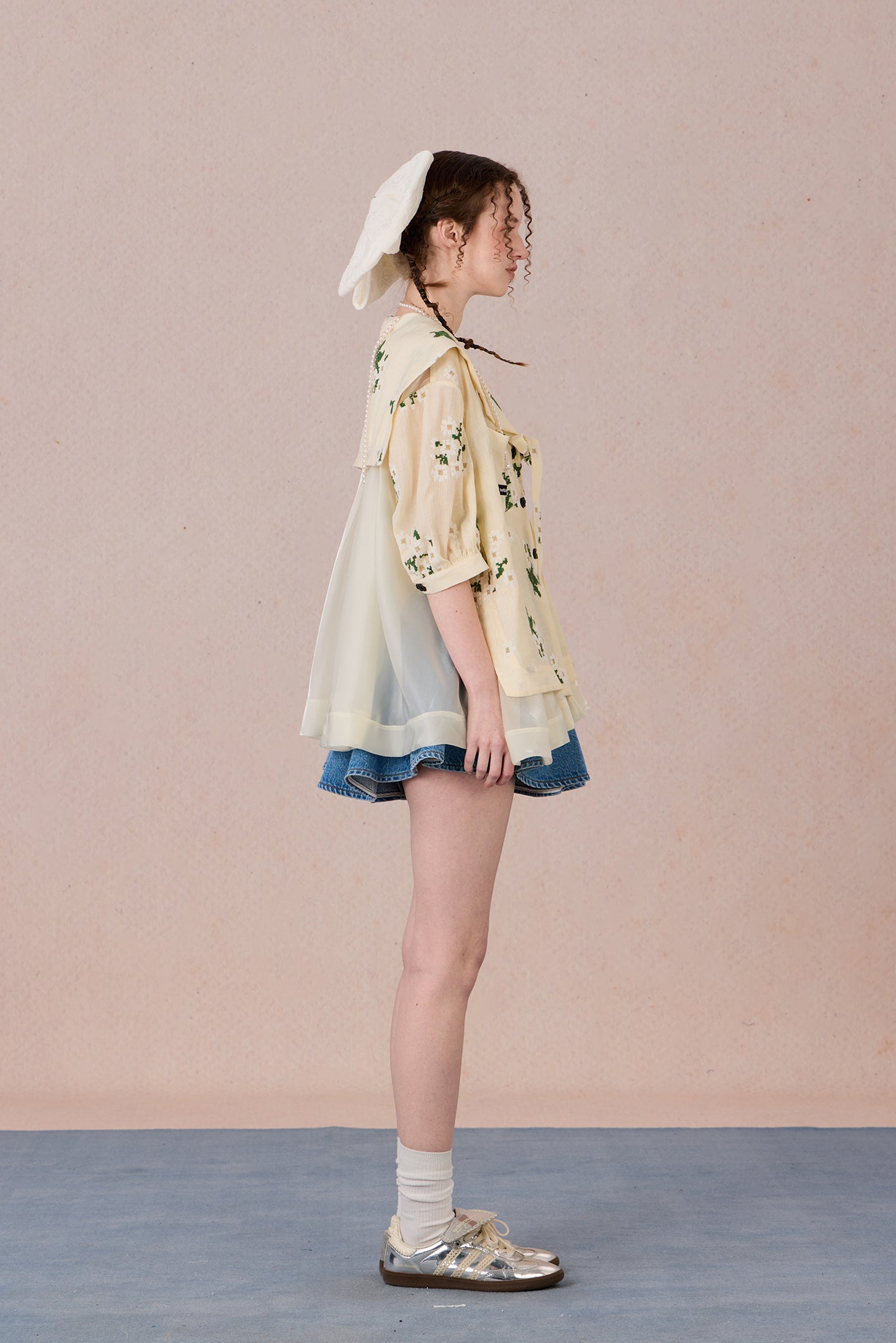 V-neck shirt with tie detail and soft floral print
