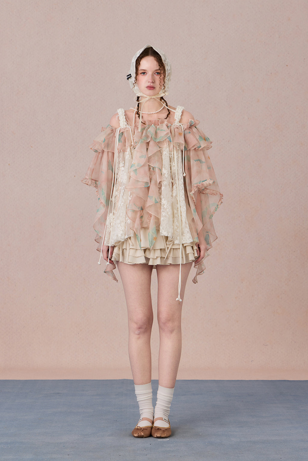 Strapless romantic blouse with asymmetrical lace overlay