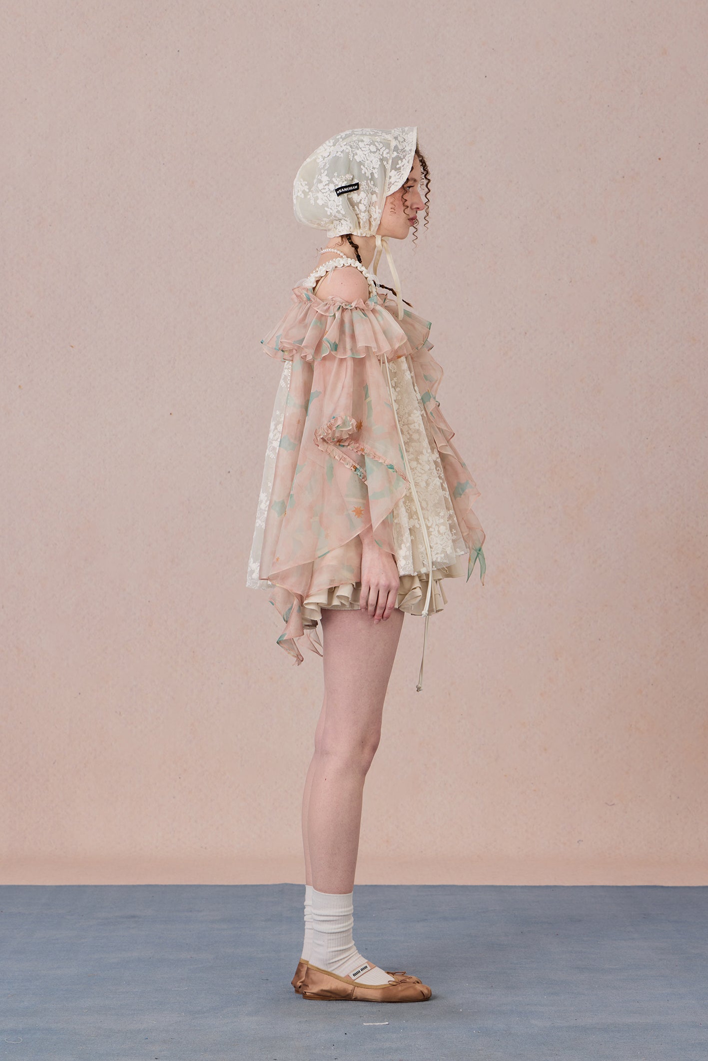 Strapless romantic blouse with asymmetrical lace overlay