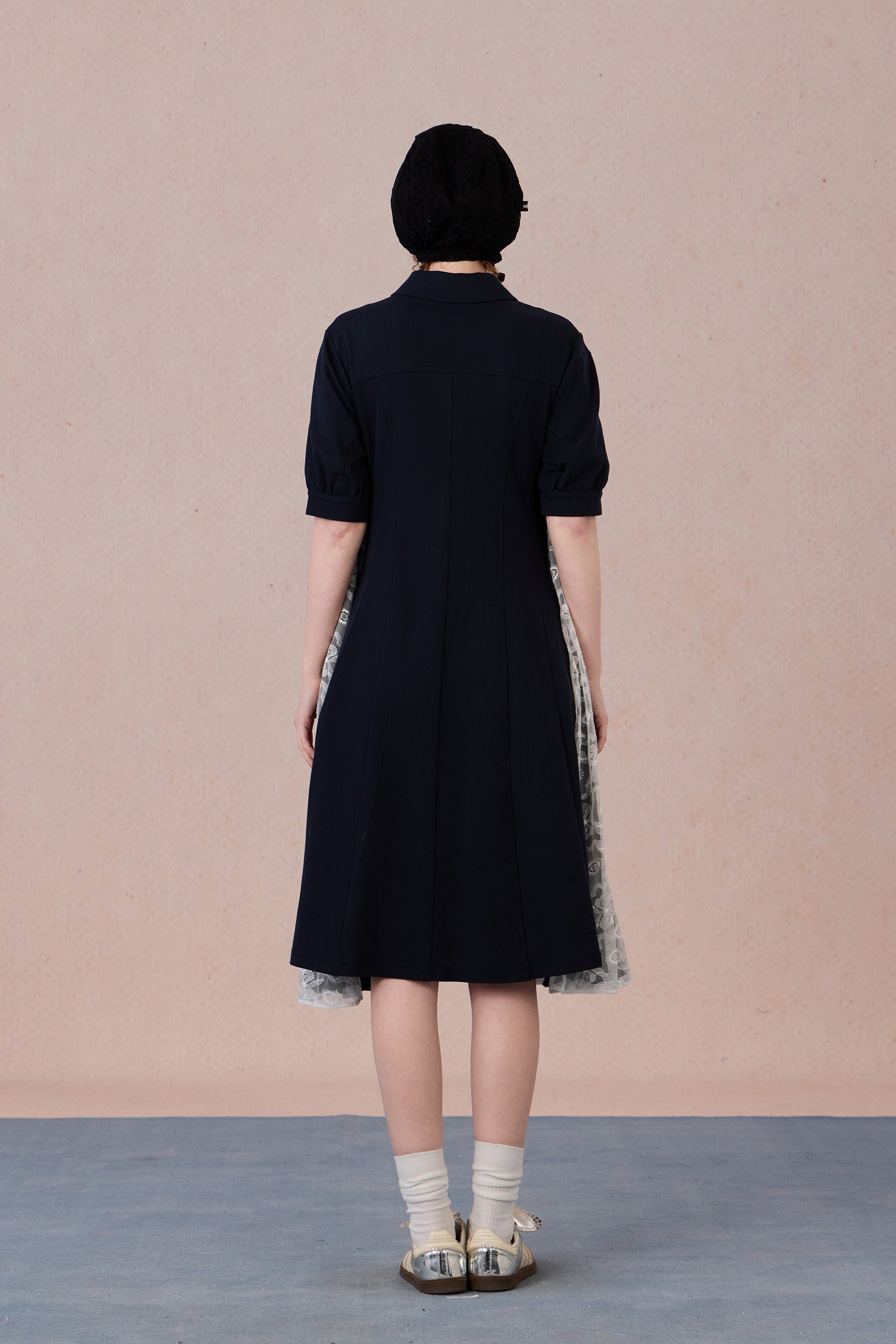 	Model wearing lace-trimmed polo midi dress with pearl accents – WEANCHEAM