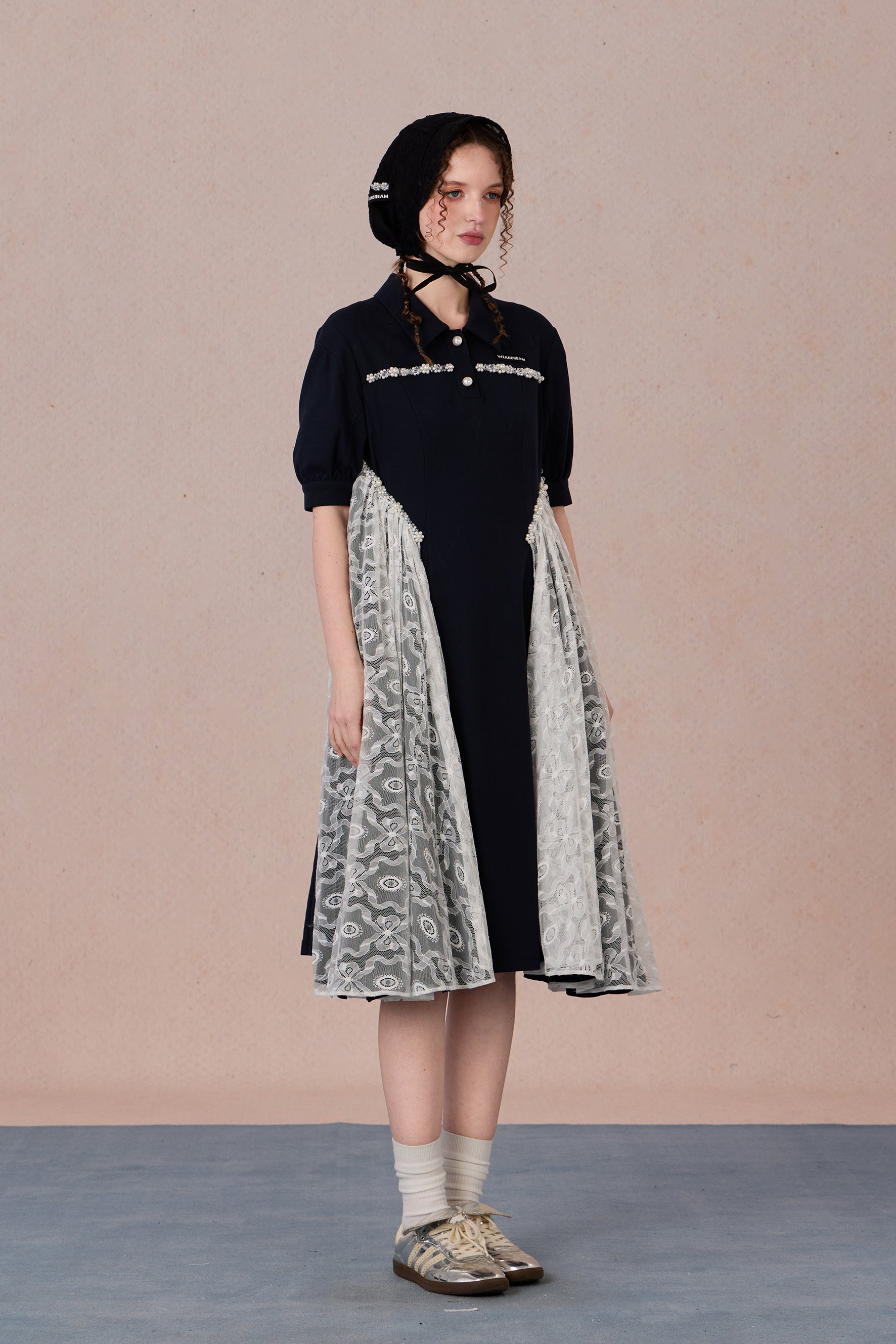 	Model wearing lace-trimmed polo midi dress with pearl accents – WEANCHEAM