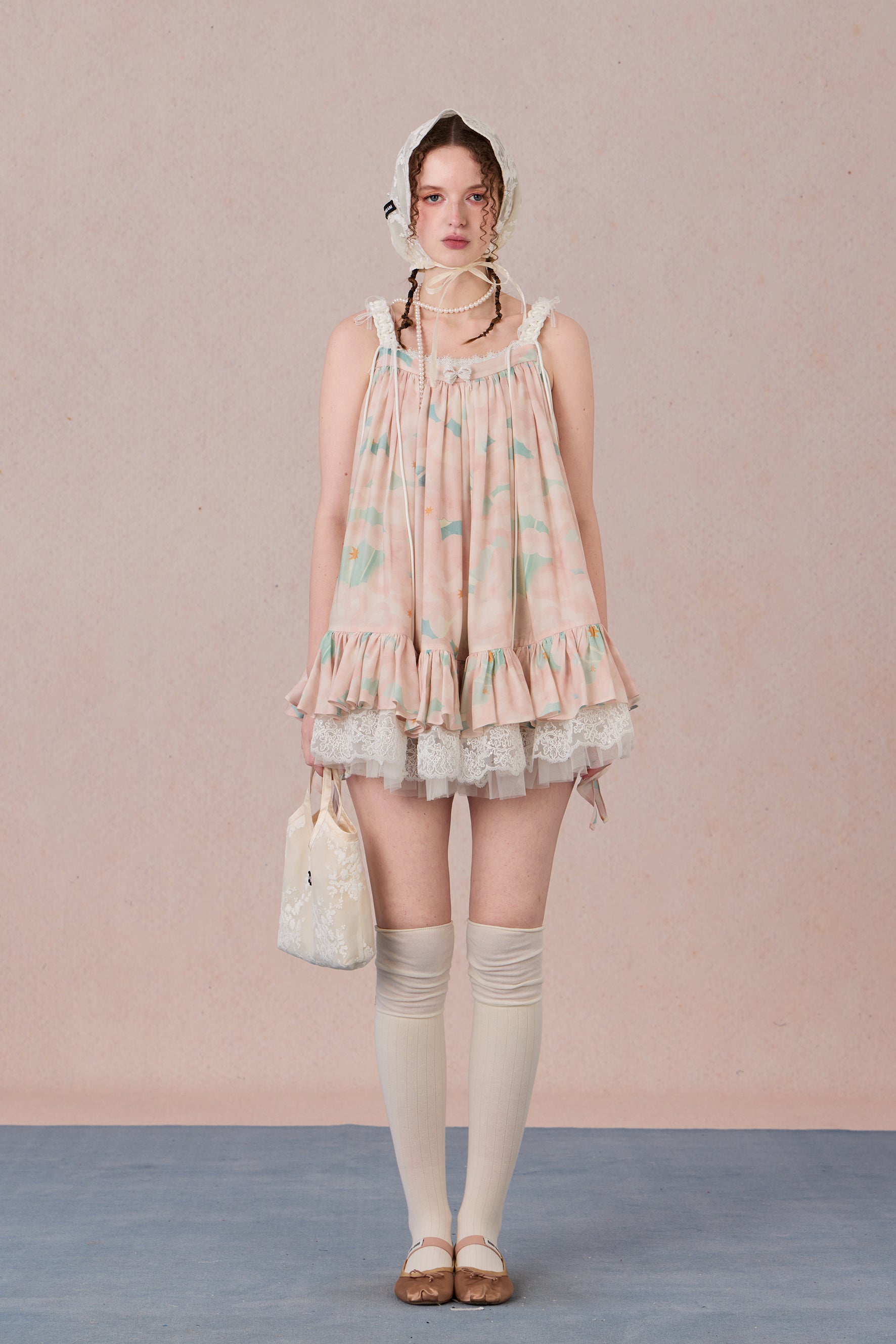 Model wearing romantic striped halter dress with tiered hem – WEANCHEAM