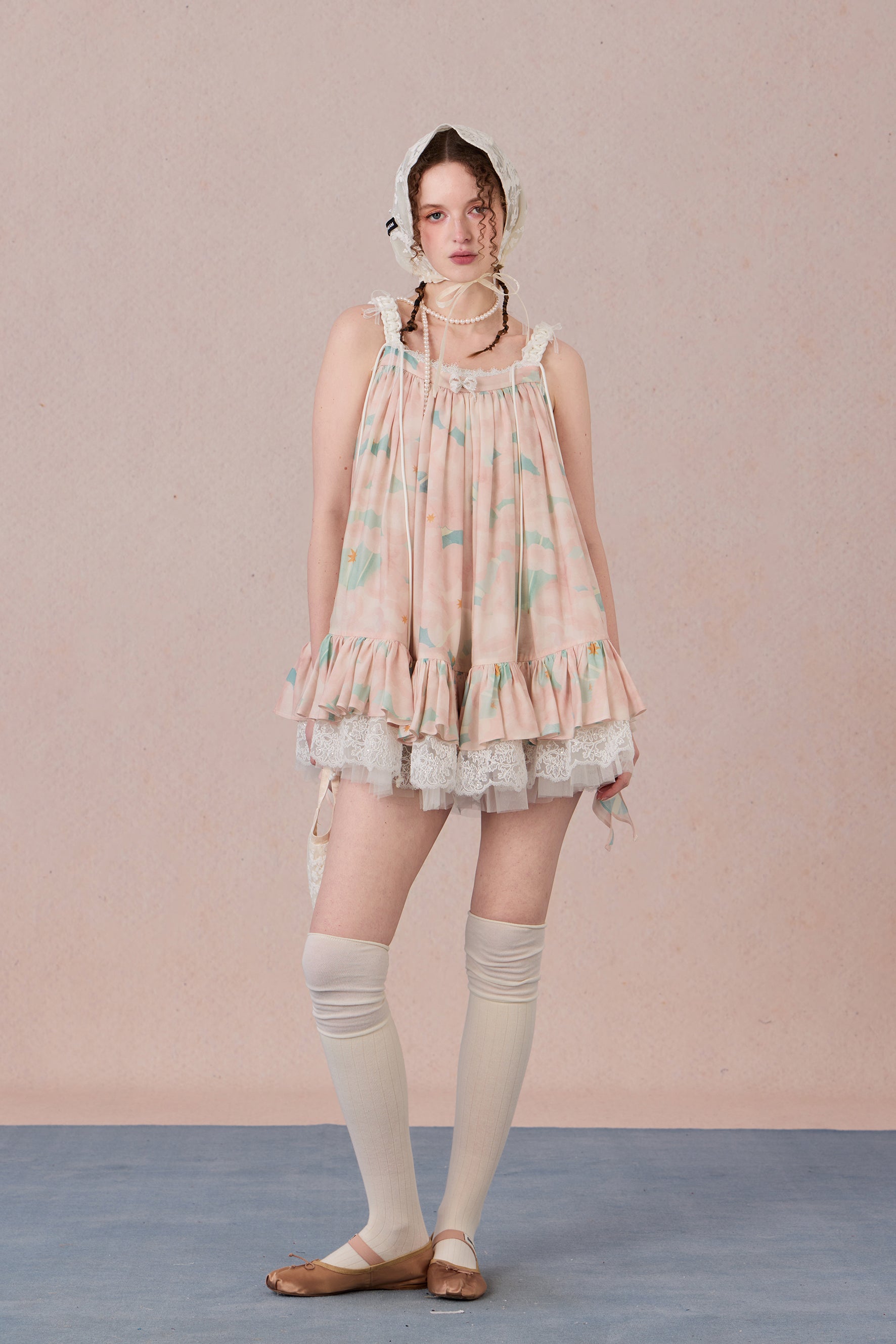 Model wearing romantic striped halter dress with tiered hem – WEANCHEAM